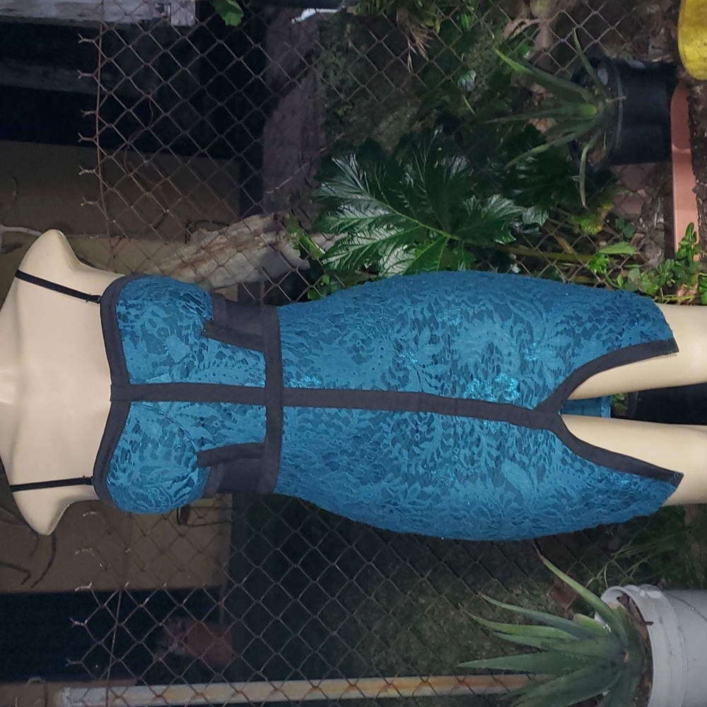 Blue dress with some mesh on the sides